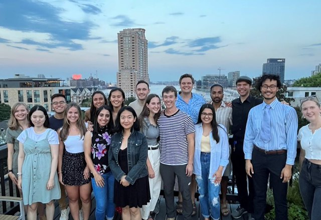 students with the baltimore skyline